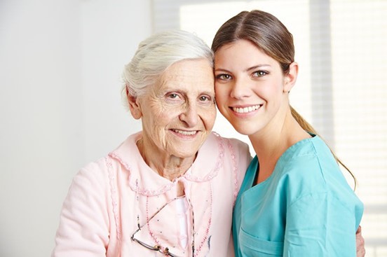 Caregiver with elderly woman