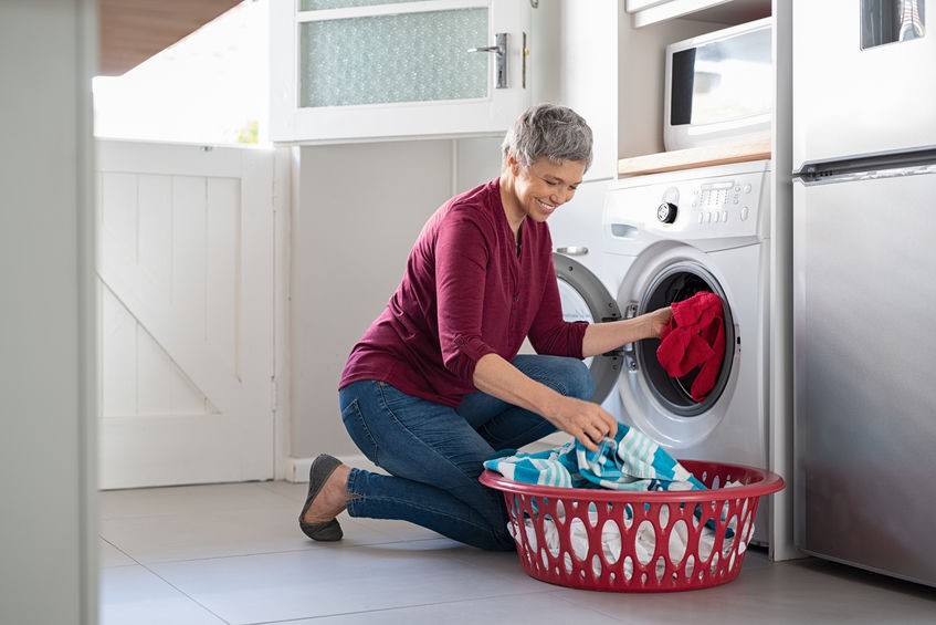 Senior woman doing laundry