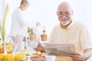 Senior couple having breakfast together