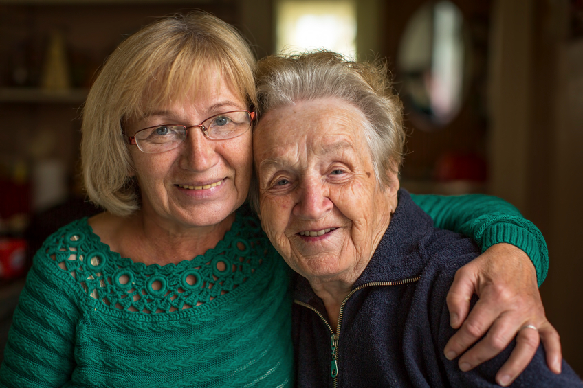 home health care provider helps senior adult