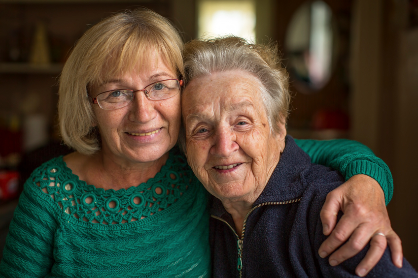 elderly person with her companion