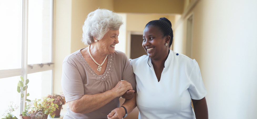 home care aide with an elderly woman