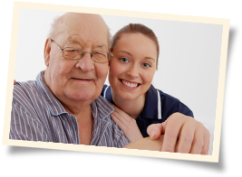 provider of Alzheimer's care in Alamosa sitting with elderly man