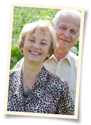 elderly man and woman smiling