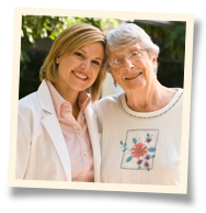 provider of elderly care in Rancho San Diego standing with senior patient