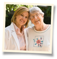 provider of transitional care in West Chester standing with elderly woman