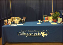 visiting angels booth set-up