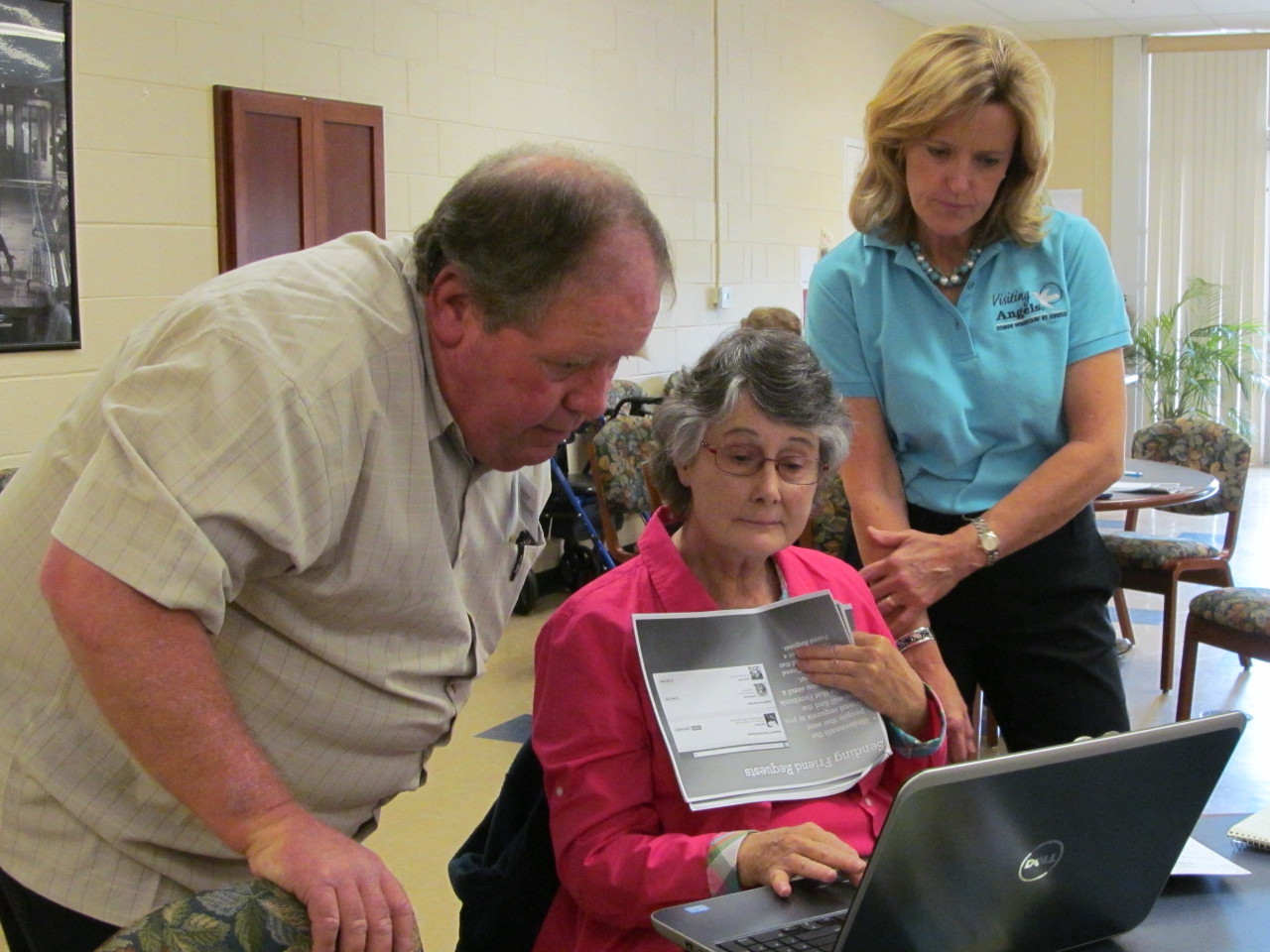 Kathy helping a student