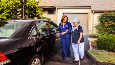 Caregiver helps senior to care