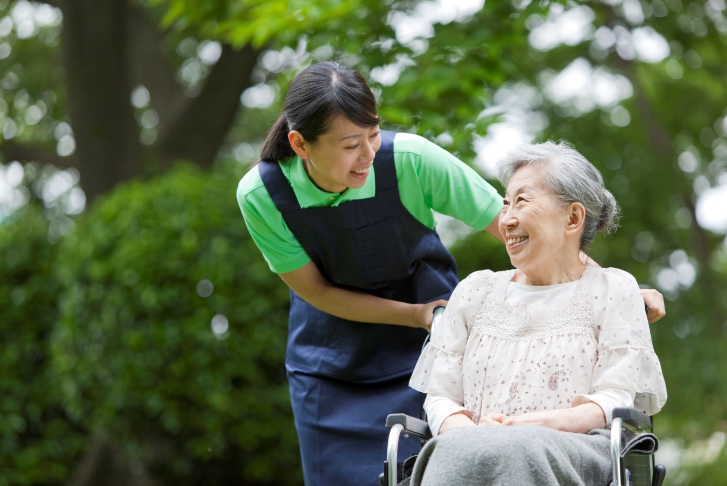 Home care aide serves an elderly person with care and respect in Westwood and Norwood, MA