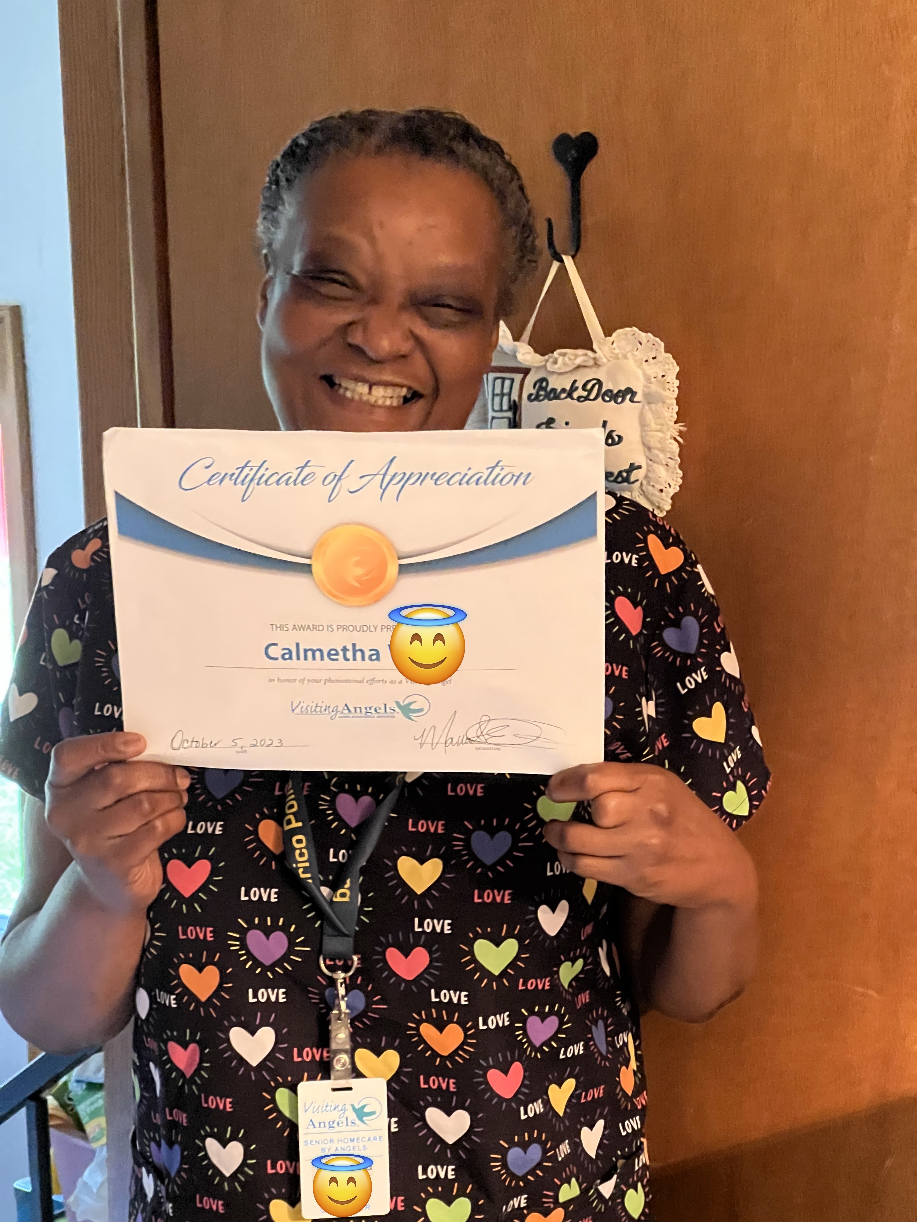 Caregiver holding certificate