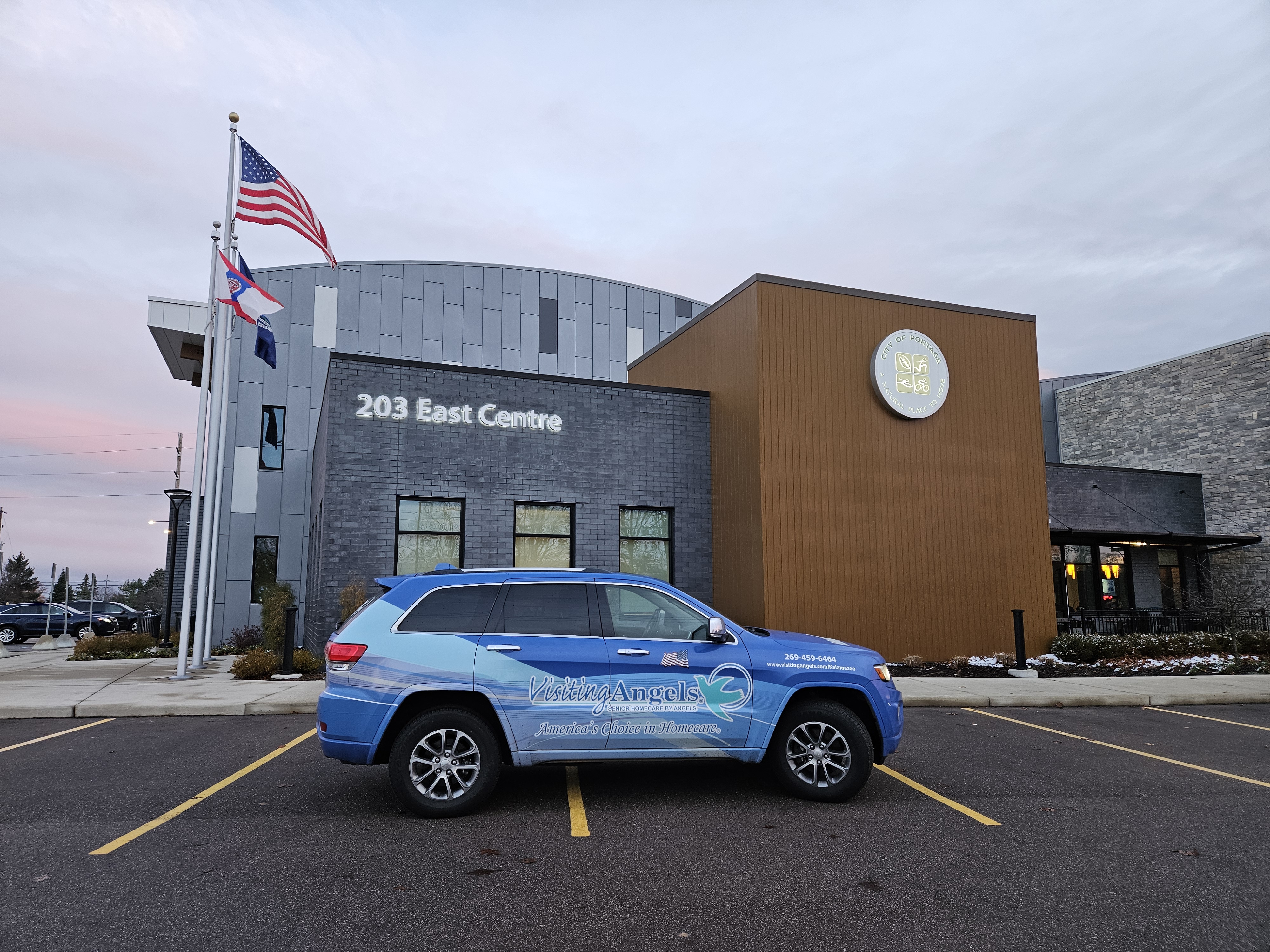 The Visiting Angels of Southwest Michigan vehicle parked in front of the Portage Zhang Senior Center.