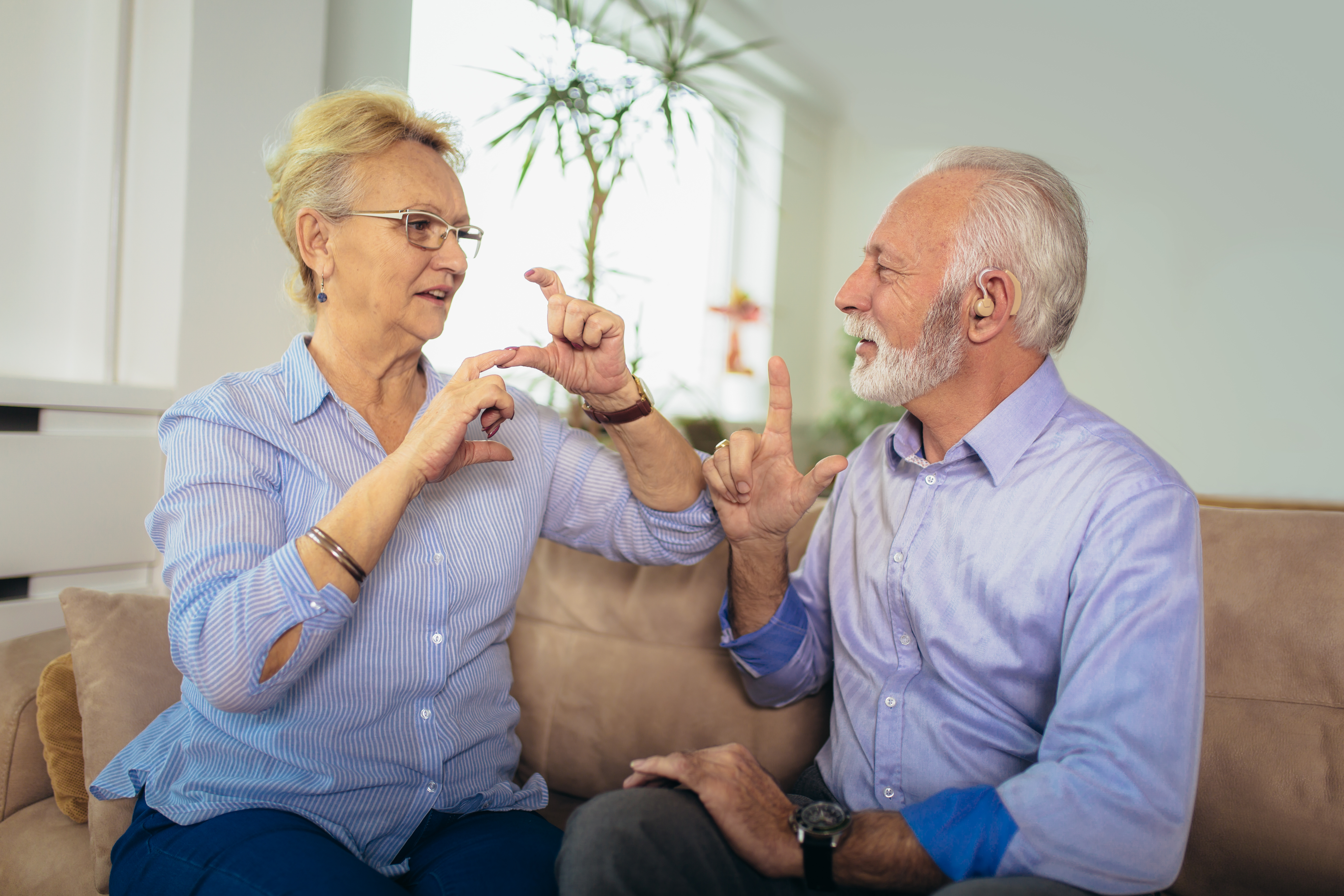 Senior woman smiling with a caregiver