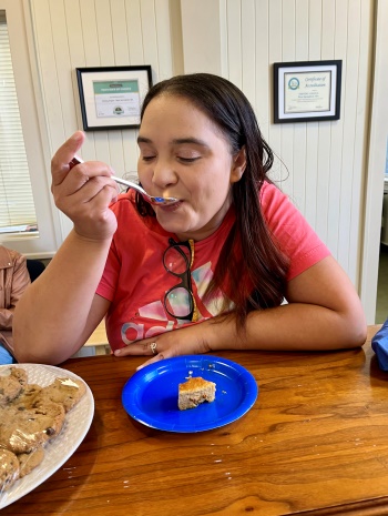 caregiver enjoying hispanic heritage food