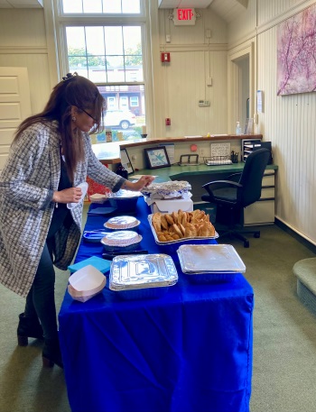 office staff at food table